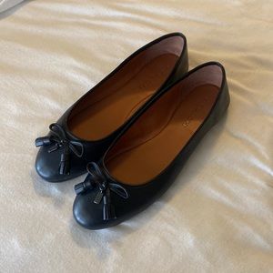 Coach brand women’s black flats size 8.5.